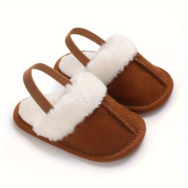 Adorable baby slippers, from 0-18 months, with plush lining for warmth and soft soles for comfort. Perfect for autumn, indoor leisure, and early walking.