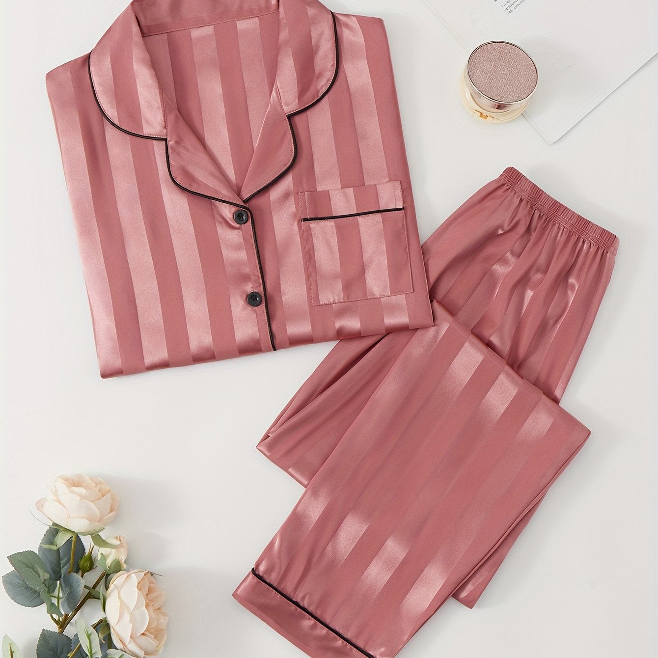 Women's satin pajama set with striped long sleeve top and lounge pants for sleepwear and loungewear.