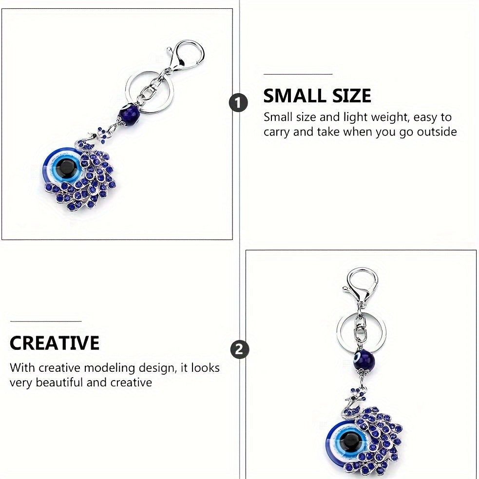 Blue Evil Eye Keychain with Rhinestone Inlaid Peacock Design, made from Alloy, Perfect for Women's Daily Use as a Trendy Hanging Pendant or Bag Charm.