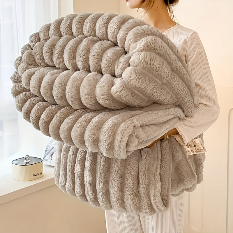 Get cozy with this multifunctional blanket made of ultra-soft milk fleece. Featuring a modern striped texture, this blanket is perfect for all-season comfort on your bed, sofa, or even while camping. Machine washable for easy care, this blanket is an