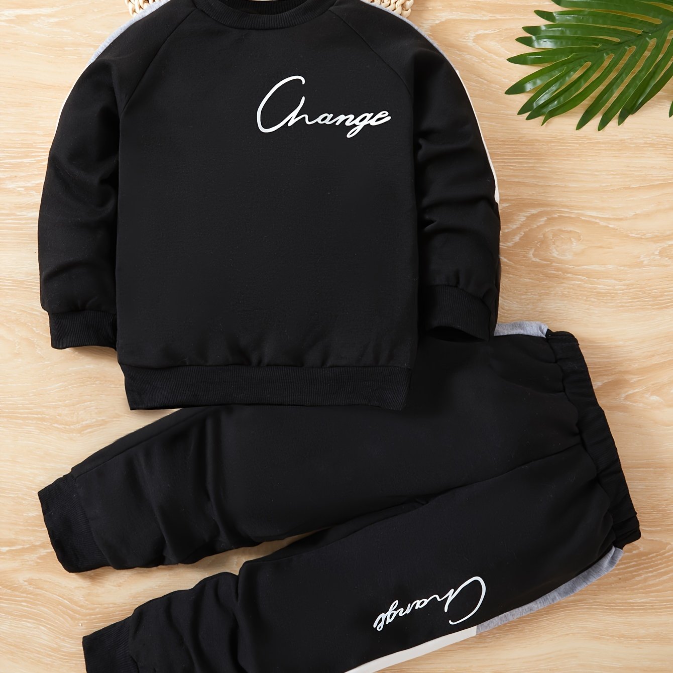 2-piece casual outfit for toddler boys with sweatshirt and sweatpants featuring CHANGE print for spring and fall daily wear.