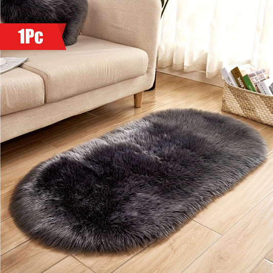 One piece of a luxurious Super Soft Area Rug, featuring a Plush Fluffy Faux Sheepskin design in an Oval shape, perfect for adding warmth to your Living Room or Bedroom. This Machine Washable Bedside Rug is made of Shaggy Plush Carpet Faux material, ideal