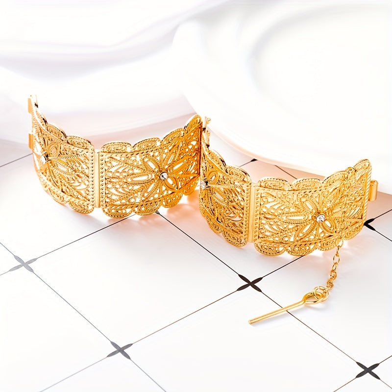 A luxurious gold-plated metal bracelet designed for women's jewelry, perfect for an Arab traditional festival, a bride's wedding ensemble, or as a beautiful wrist accessory.