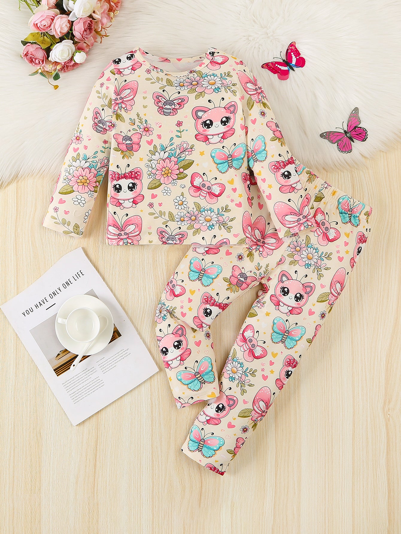 Girls' 4-piece pajama set with cute butterfly, girl, donut, and dinosaur patterns. Comfy for all seasons, made with stretchy polyester blend. Great daily gift.