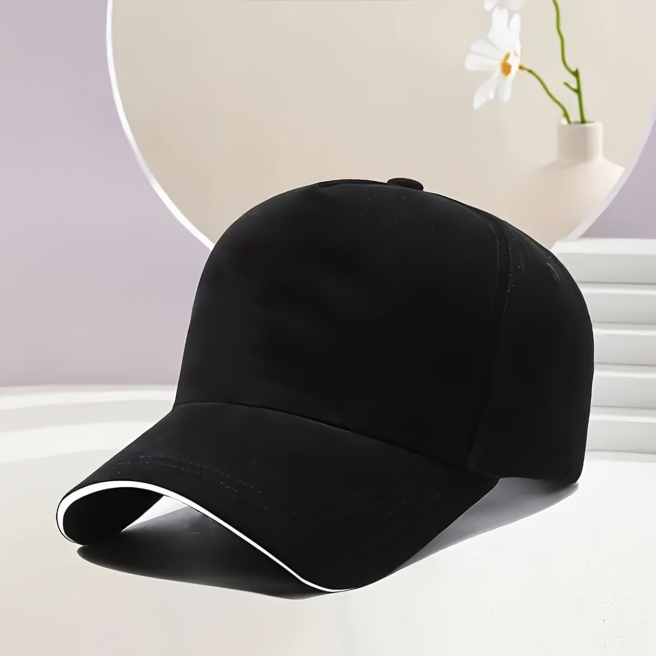 Lightweight polyester sun hat with adjustable drawstring closure for urban summer style.