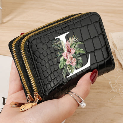 Women's credit card wallet with elegant floral letter print in black & white. Features large capacity, dual zipper, crocodile texture PU, lightweight design with nylon lining for everyday