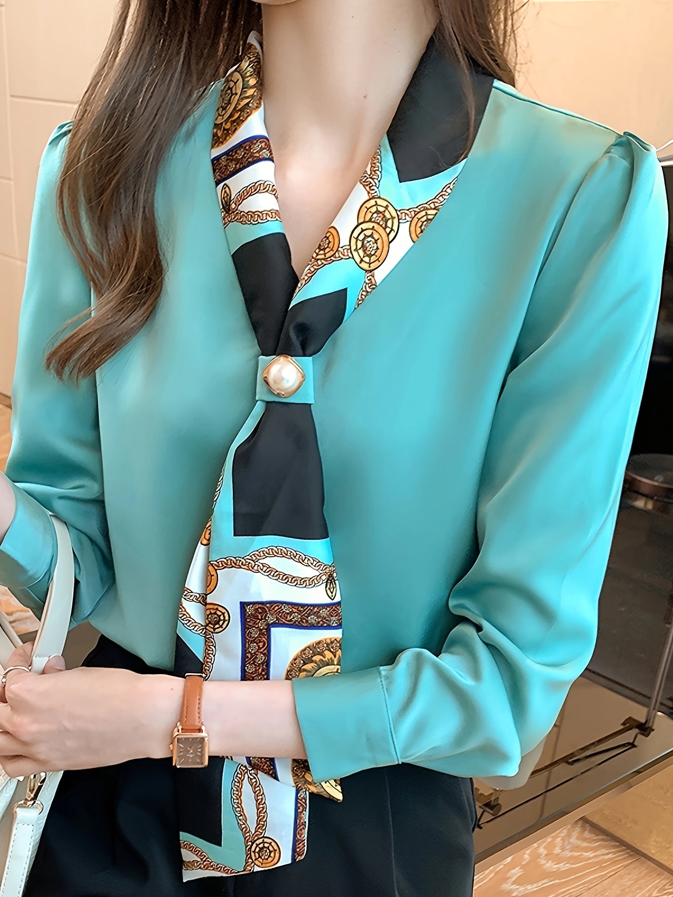 Polyester tie neck blouse with long sleeves, button detail print for women. Regular fit woven top, fashionable all-season style.