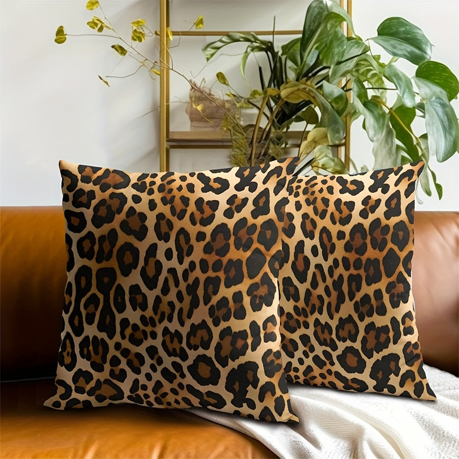 Set of 2 Leopard Print Throw Pillow Covers - featuring a stylish Cheetah Design. Made of durable polyester material, each cover measures 40.64x40.64 cm and is equipped with a convenient zip closure for easy removal and cleaning. Machine washable, perfect