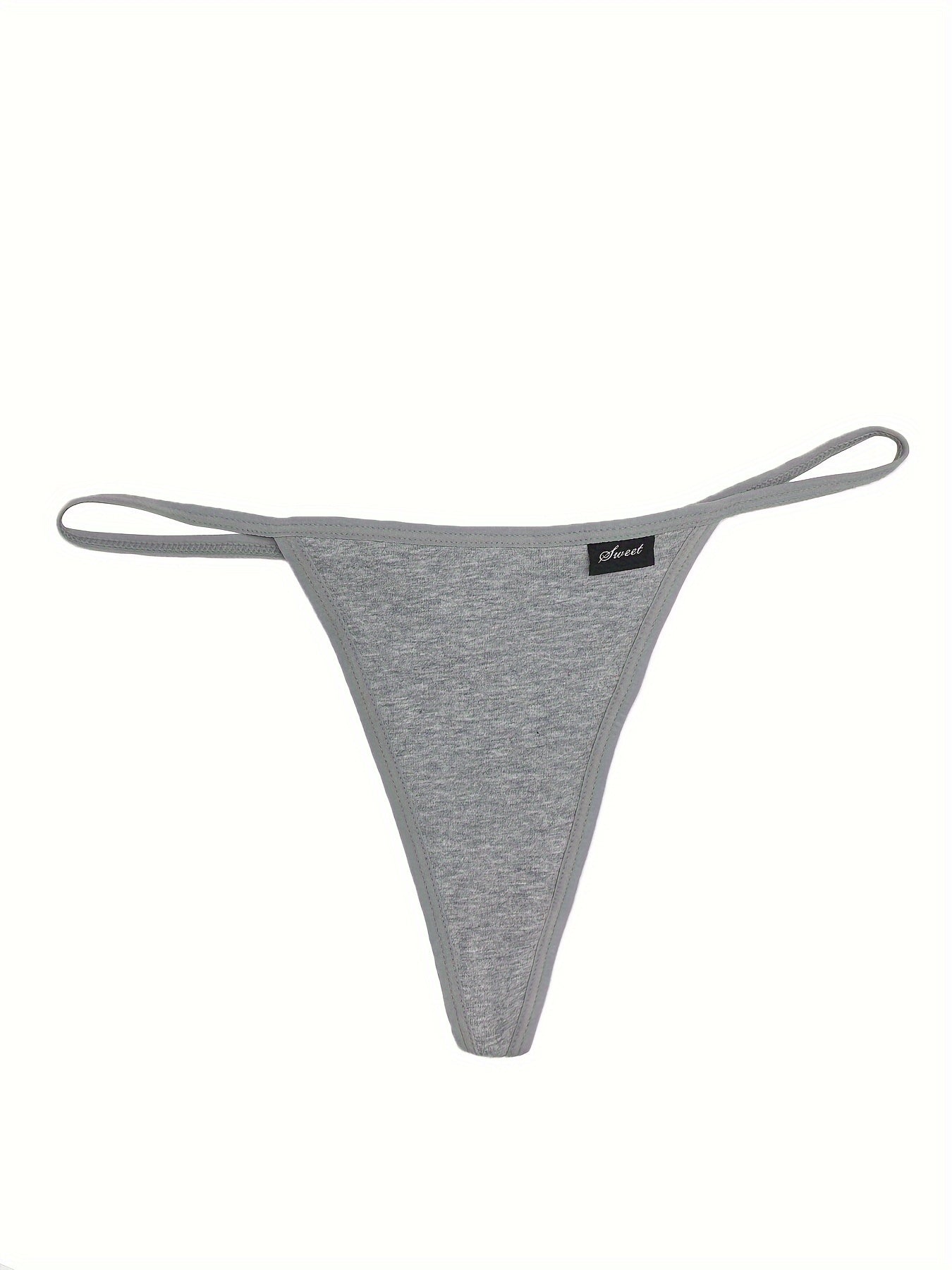 Plus size women's white thong panties with soft stretch fabric and "SANQIU" waistband.