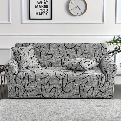 Elastic leaf-printed sofa slipcover for non-slip protection and decor in the living room.