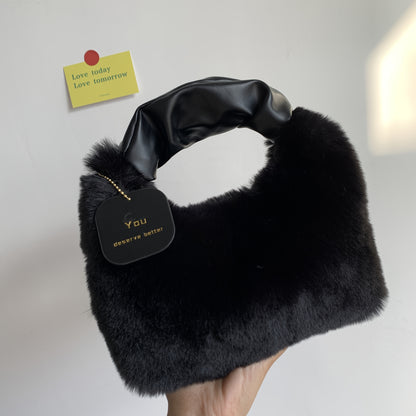 Stylish plush crossbody bag for women in faux fur with adjustable strap and zip closure. Perfect for fall/winter in khaki, light grey, dark khaki, cream, or pink.