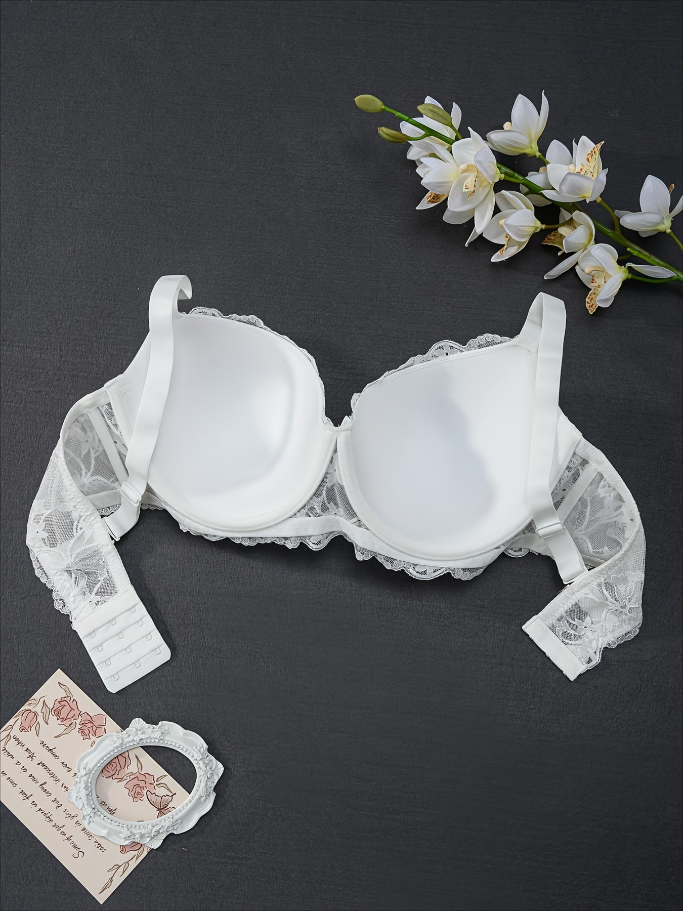 Elegant floral lace underwire bra for plus-size women with bow decor.