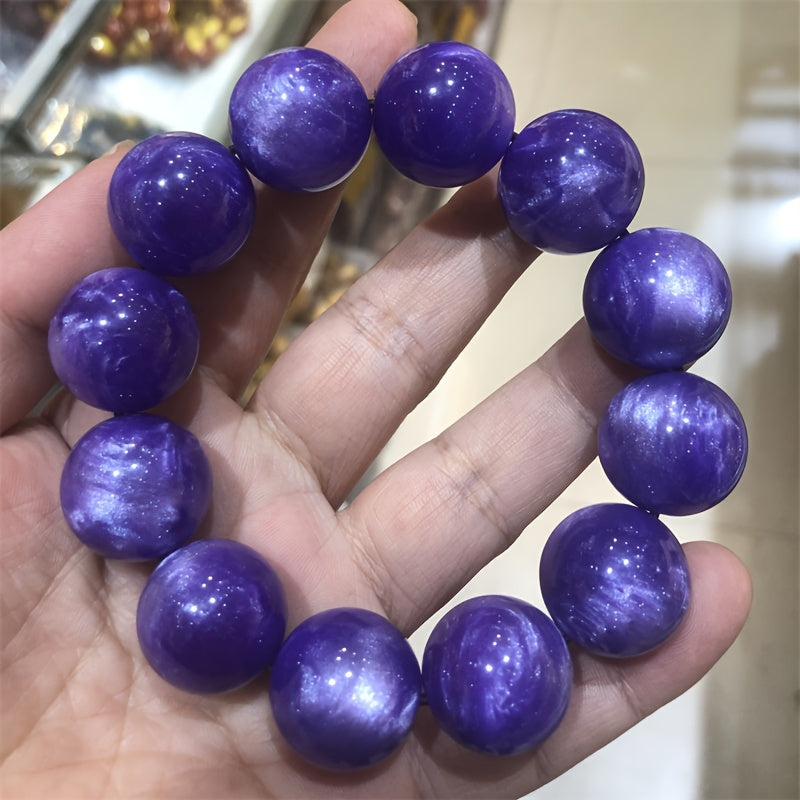 A stylish unisex bohemian 20mm bracelet featuring an elegant purple amber bead, ideal for both daily wear and special occasions. This bracelet makes a wonderful gift choice for Christmas and festivals.