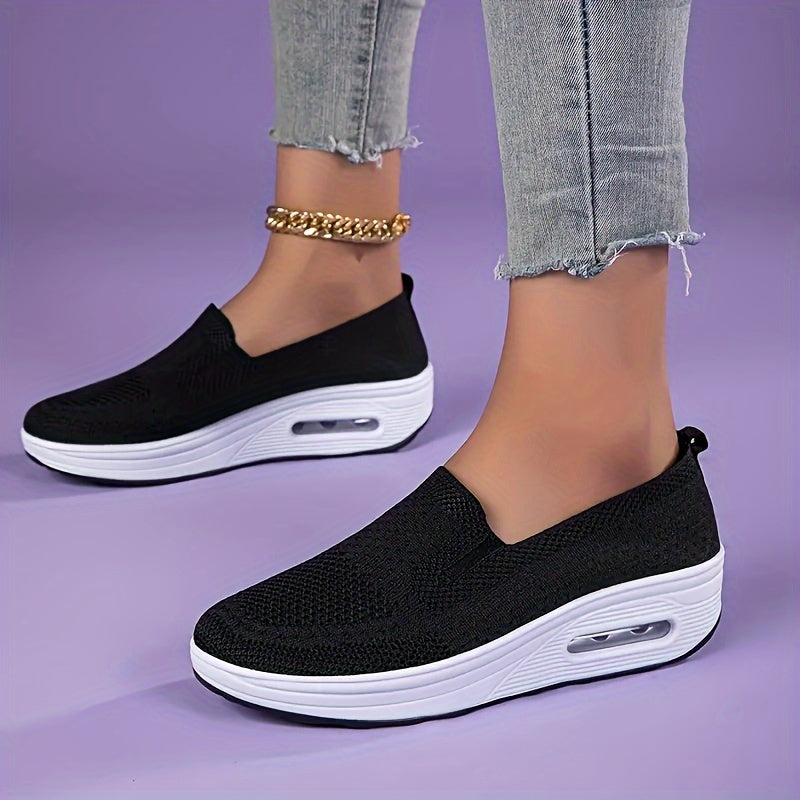 Women's slip-on sneakers from the Spring Collection in solid colors of black, light gray, pink, and dark blue. Features breathable knit fabric, air cushion sole, and low-top design for