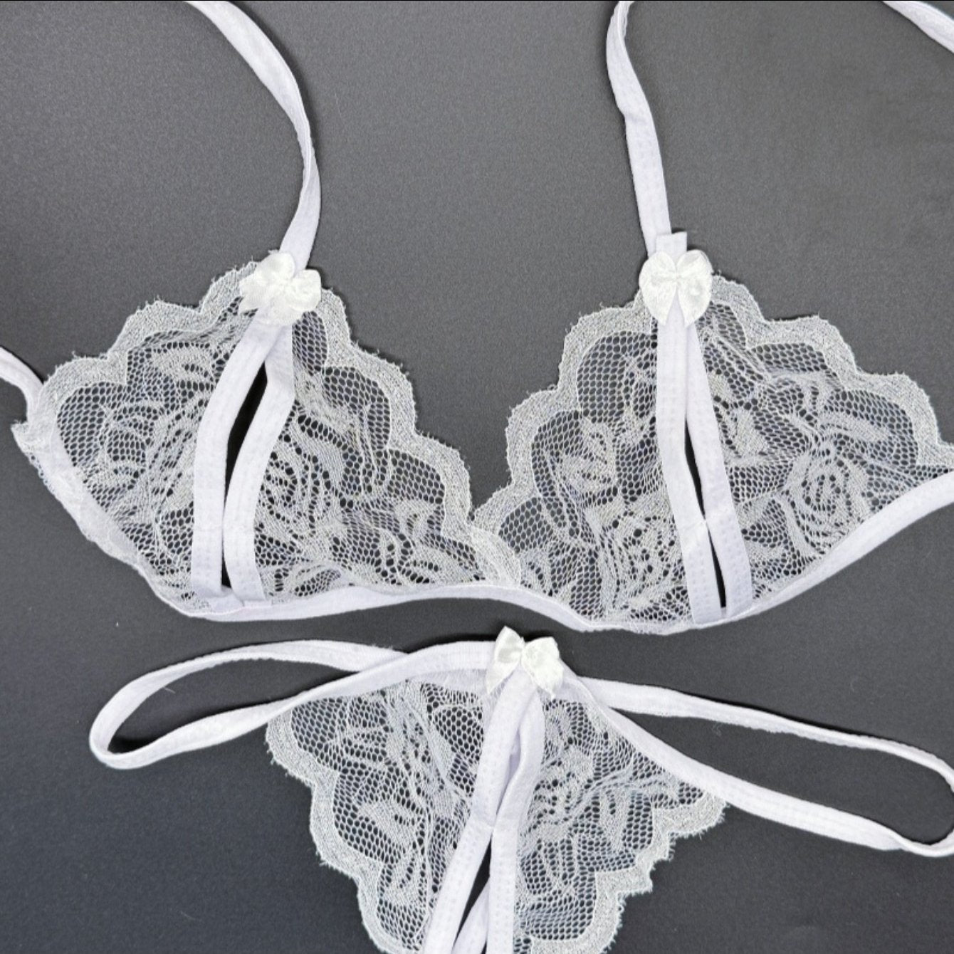 Attractive lingerie sets, bras, and crotchless panties for women.