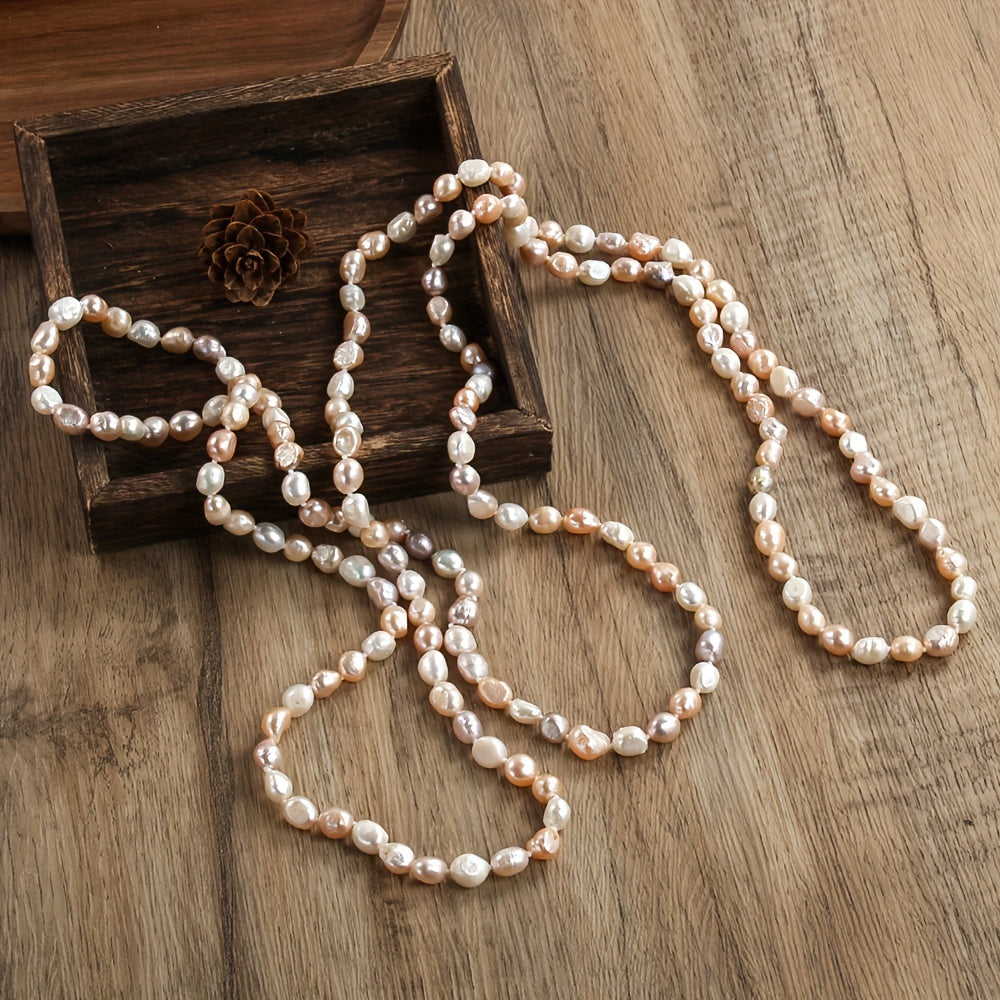 Stylish Bohemian Women's Freshwater Pearl Necklace, featuring Natural Irregular Beads in Orange Heart design. Ideal for both Daily Wear and Vacation. Measures 160cm in length with a charming White and Purple Mix. Exudes French Luxury.