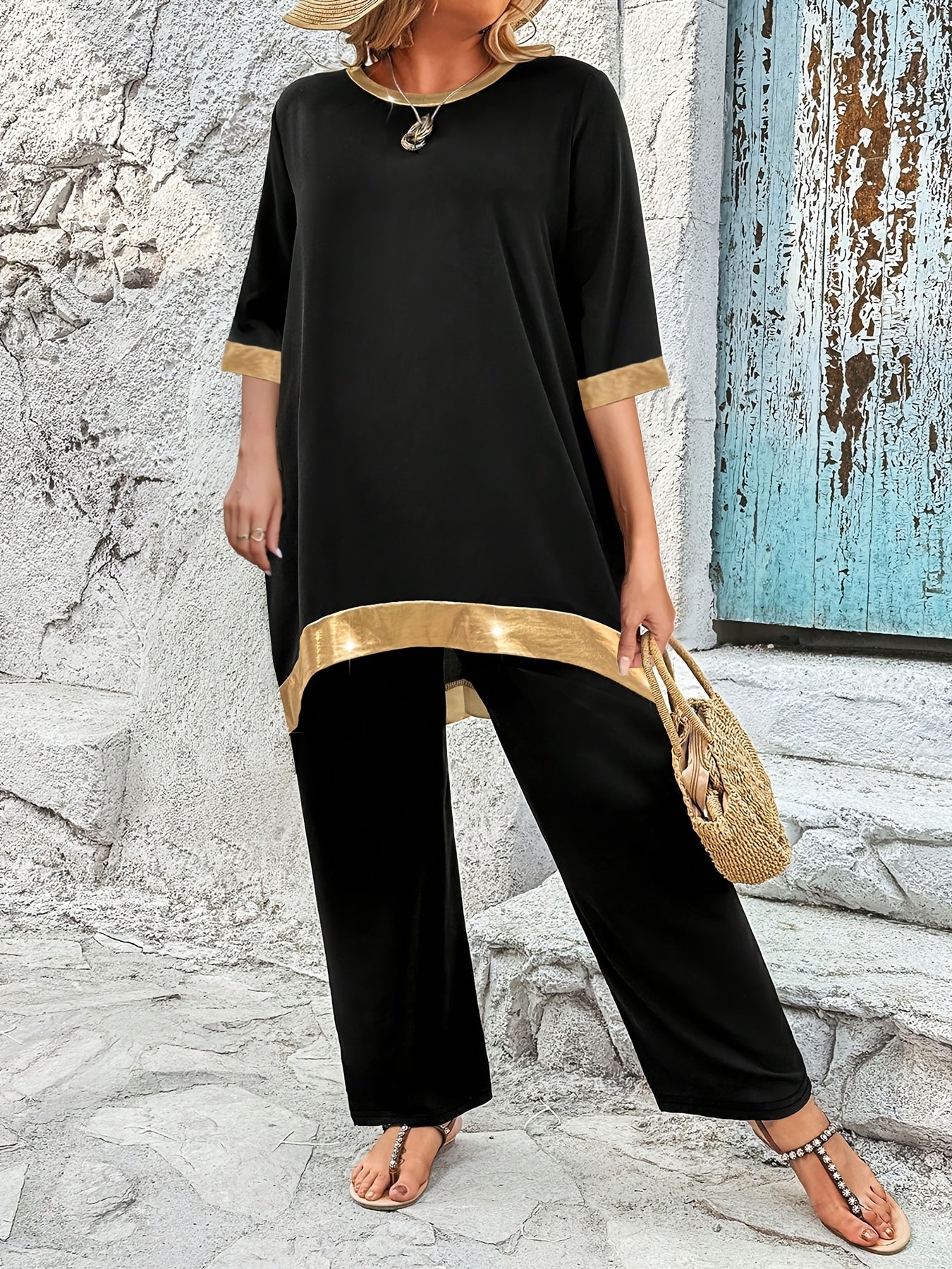 Asymmetric hem top and solid color pants in large size two-piece set.