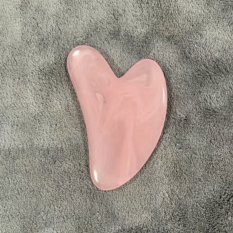 Heart-shaped resin Gua Sha tool for facial and full body hair removal, high-quality for beauty salon use.