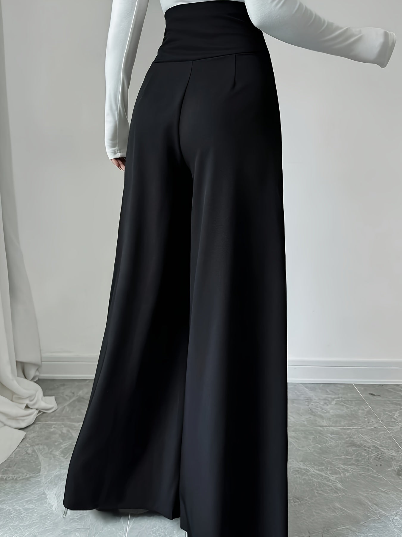 Black high-waisted wide leg pants with decorative buttons for spring & summer, machine washable & chic