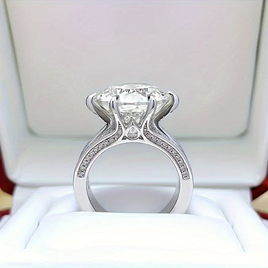 This exquisite 5.09/10.09ct Moissanite Engagement Ring features a stunning design in 925 Silver, complete with a GRA Certificate. Ideal for Valentine's Day, birthdays, or anniversaries, this ring makes a perfect gift for that special someone. With its