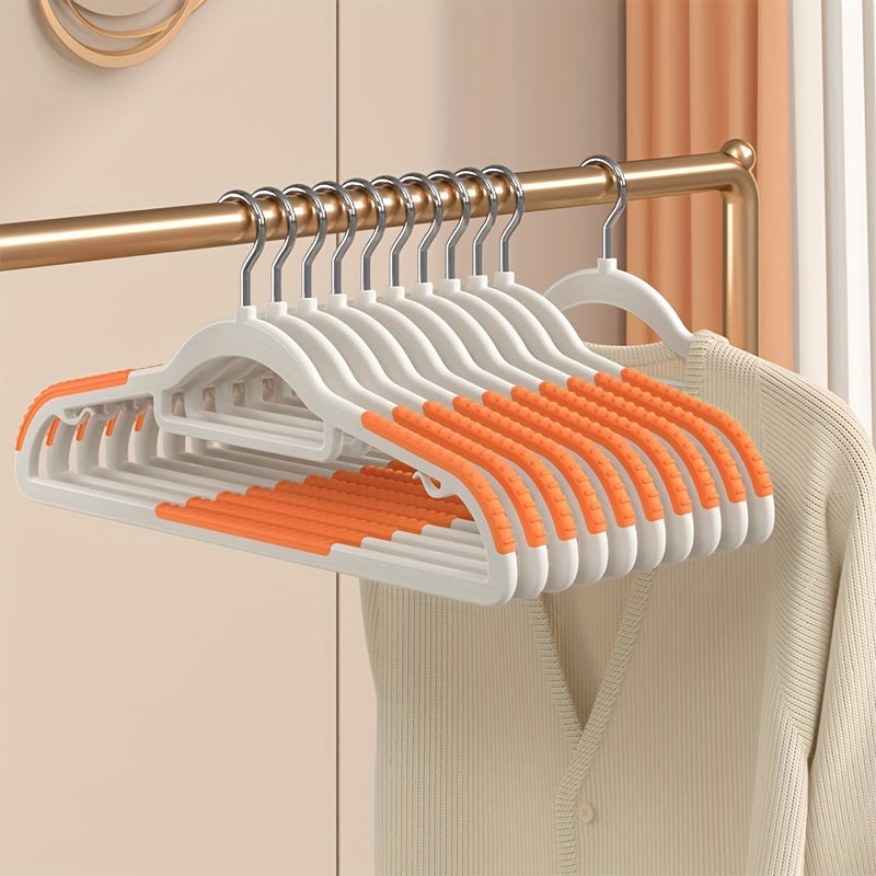 10 non-slip heavy duty clothes hangers for storage and organization in bedroom, bathroom, and home.