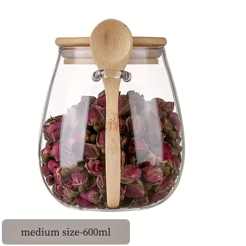 Introducing a single glass jar with a bamboo lid, designed with a wide opening and leak-proof features. This jar includes a spoon and can be reused. Perfect for storing coffee beans, tea, grains, dried fruits, and more. Available in three sizes