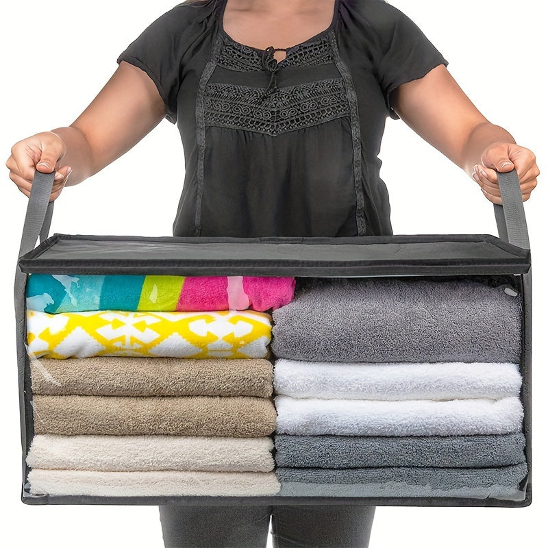 Large clothes storage bag with convenient handles and a clear viewing window - great for storing quilts, blankets, and keeping your bedroom organized. Perfect for use at home, in dorms, or as a space-saving solution in closets and under beds. Keep your