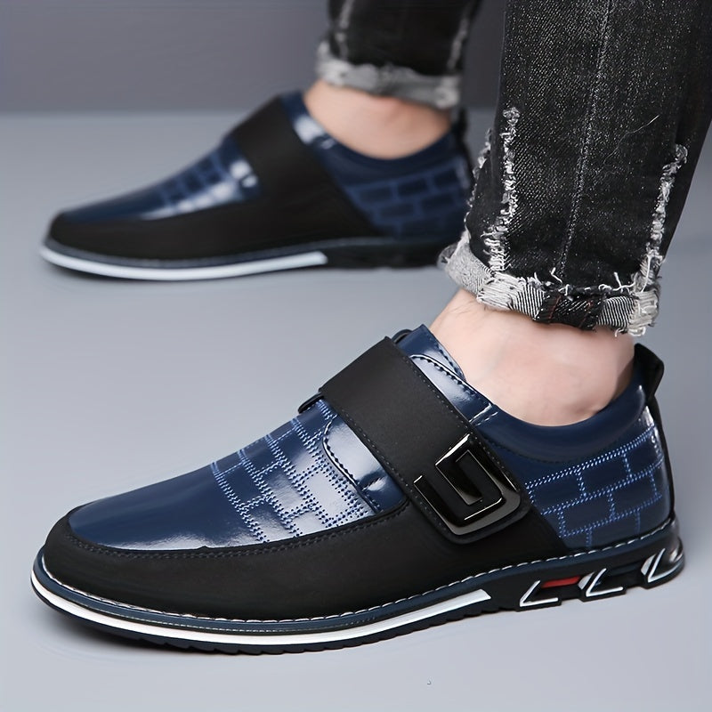 Men's dress loafers with hook and loop fastener for business or casual wear.