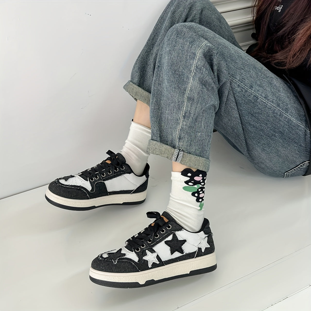 Women's graphic lace up skate shoes with thick sole, patchwork design, non-slip grip, and lightweight construction.