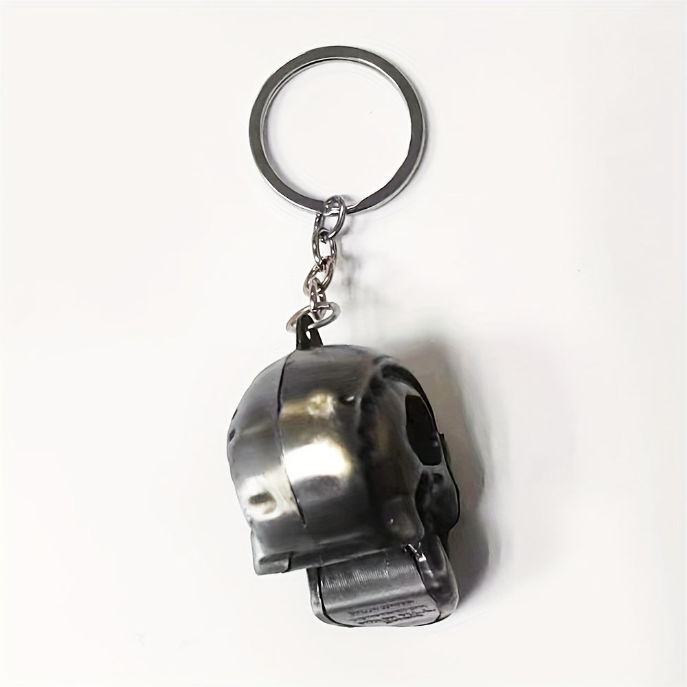 A stylish and versatile Terminator skull keychain that has a personality inspired by movies and TV shows. It is adorned with a golden pendant, adding an extra touch of flair.