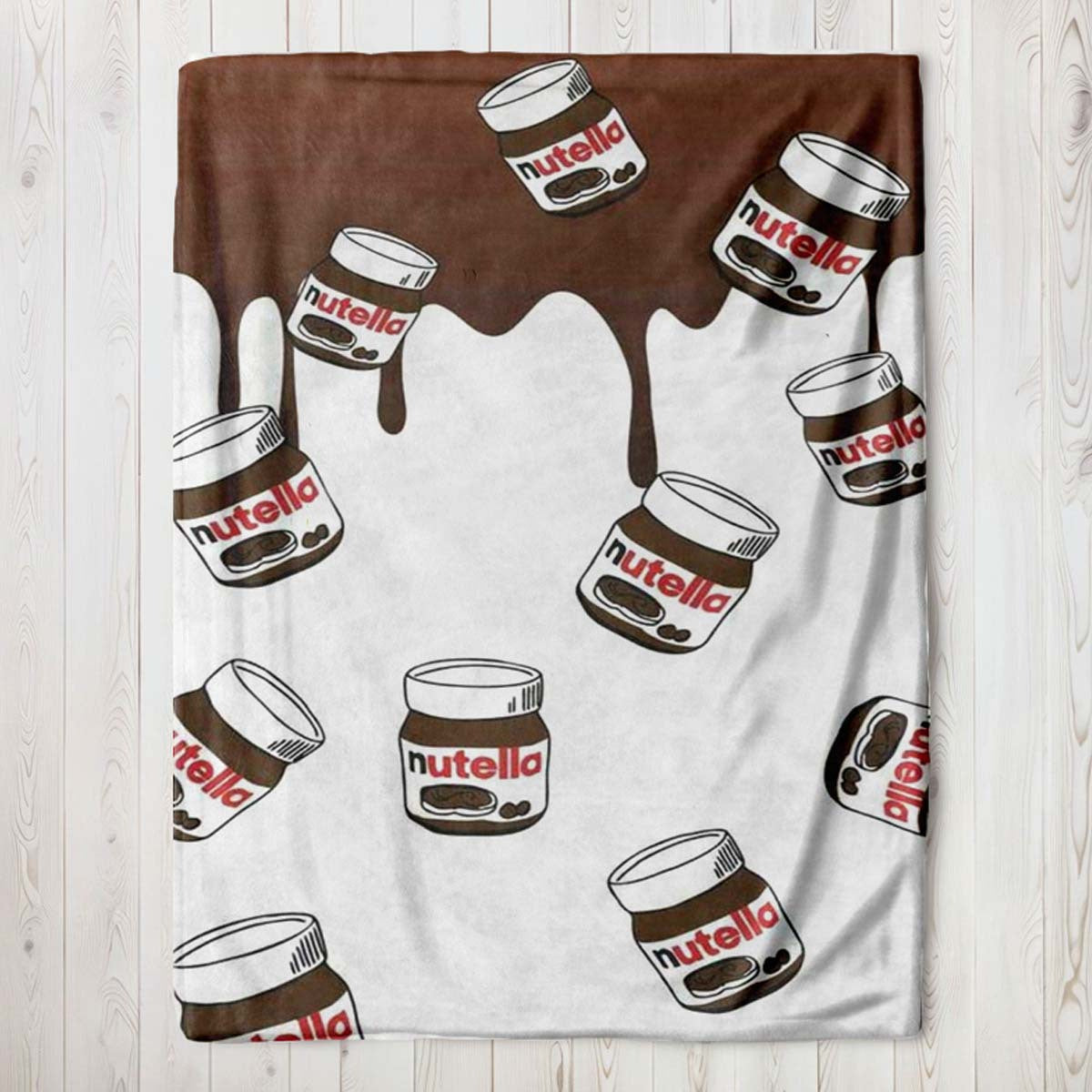 Cozy up with this luxurious Nutella Chocolate Spread Art Flannel Fleece Throw Blanket. Featuring a digital print design, this soft and cozy wrap is perfect for use on the sofa, in the office, on the bed, or while traveling. The glamorous Nutella pattern