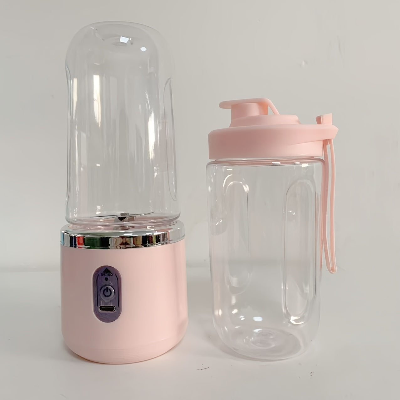 This portable blender is a personal smoothie maker with a travel lid, 2 cups each holding 13.53 ounces. It is a USB rechargeable mini fruit blender with 6 blades, making it suitable for use in the kitchen, at home, and while traveling.