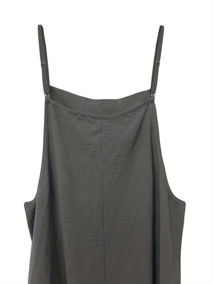 Wide leg jumpsuit with spaghetti straps, sleeveless with pockets, versatile women's clothing.