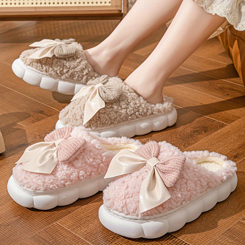 Women's winter warm plush slippers with bowknot detail and non-slip sole, perfect for autumn/winter indoor wear.