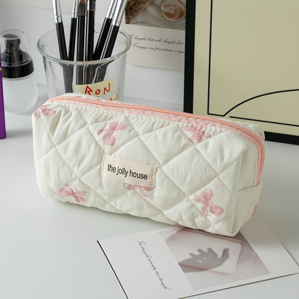 Polyester plaid pencil case with bowknot design for women and girls.