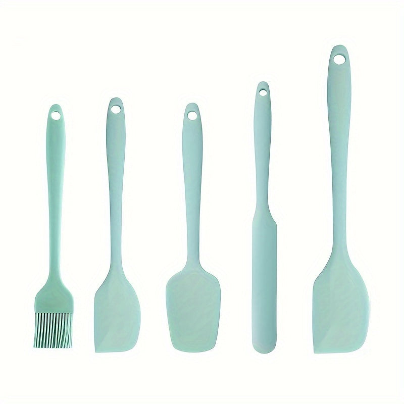 Set of 5-6 silicone spatulas, perfect for scraping cake cream and applying oil while baking. These tools are food-grade and also include a brush, making them essential kitchen gadgets and accessories.