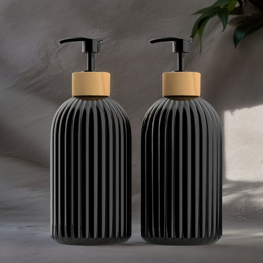 Set of two 17oz bamboo pump soap dispensers for kitchen and bathroom in black color.