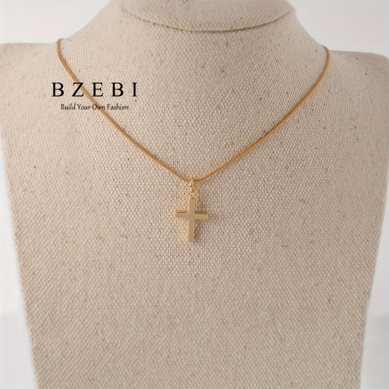 The jewelry set for women is elegant and minimalist, featuring a cross-shaped necklace and ring made of 18K gold-plated zirconia. It is adjustable and comes in a gift box, making it a perfect gift for birthdays, Christmas, Mother's Day, and Valentine's