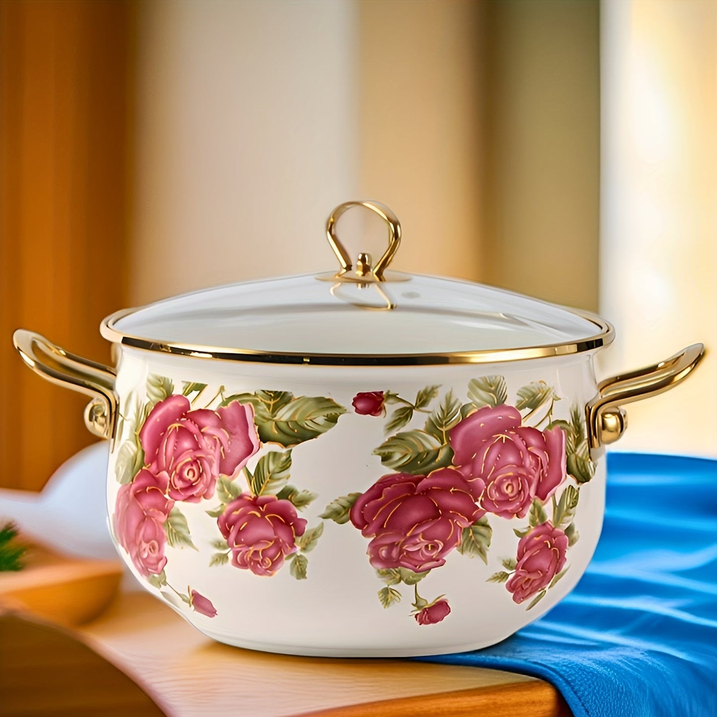 Luxurious stockpot with gold handle and lovely rose flower enamel design. Comes with a durable glass lid and is offered in four different sizes. Perfect for high-end cooking in your home or outdoor kitchen.