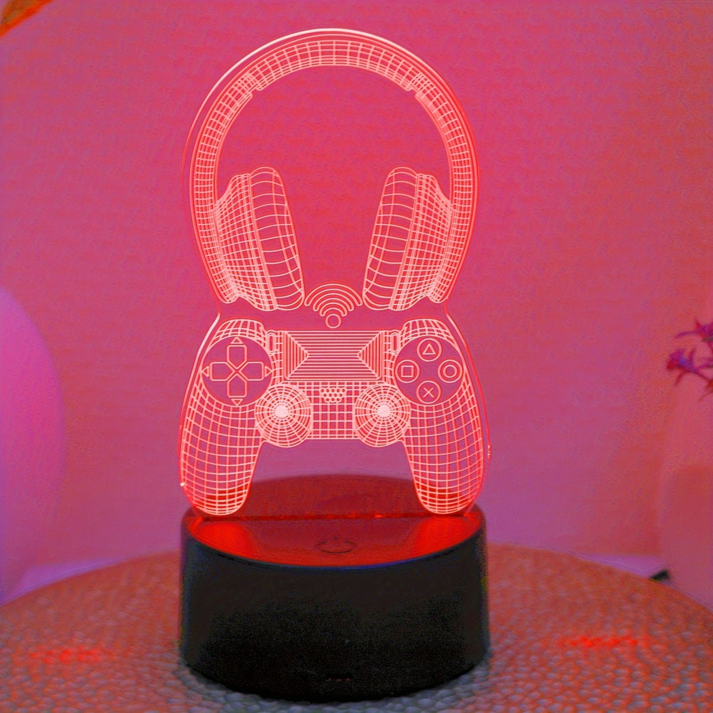 Novelty 3D night light with seven-color game headset handle design for bedroom and game room ambiance.