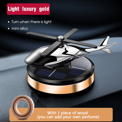 Solar rotating helicopter car decoration model for automotives without fragrance oil.