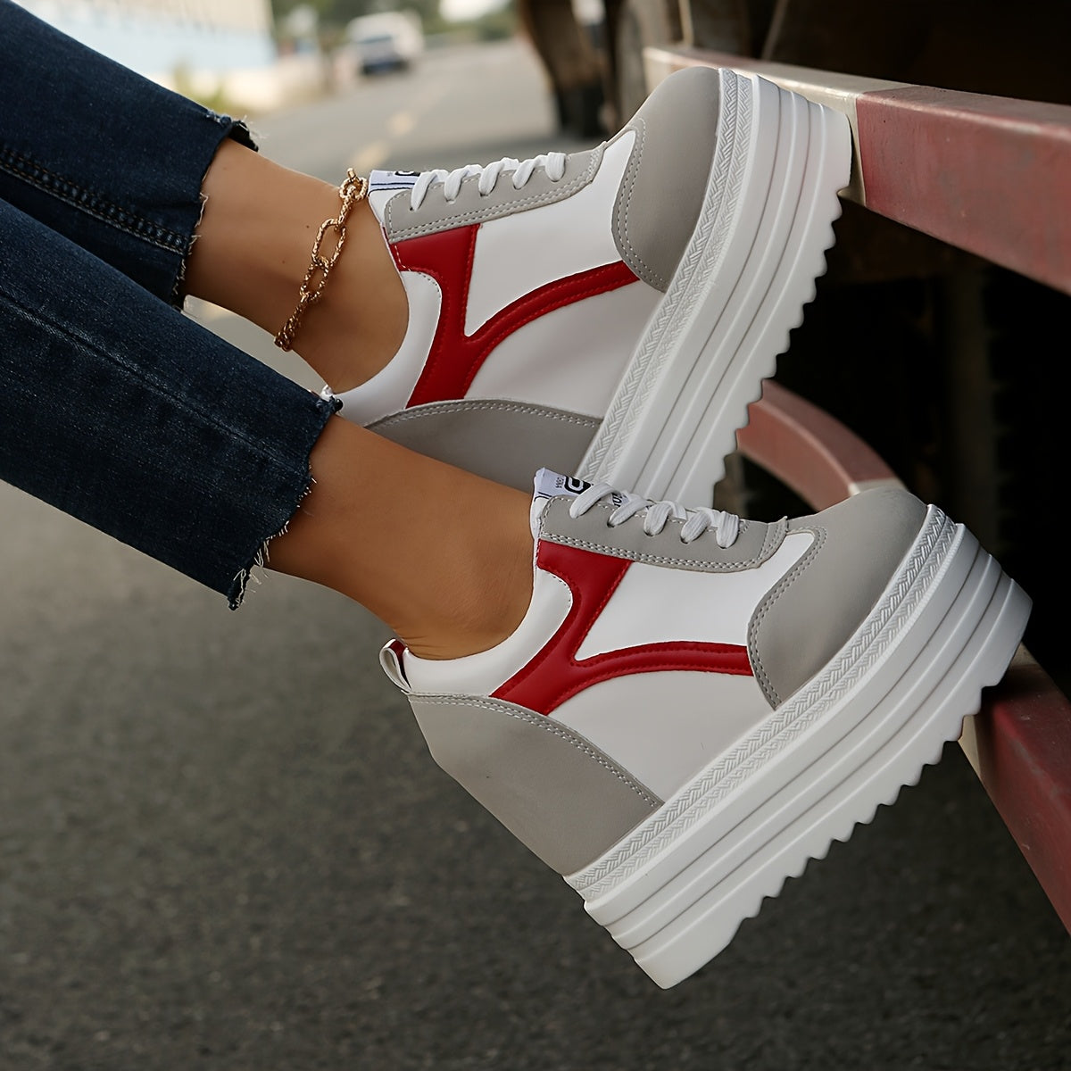 Women's platform sneakers with lace-up closure, fabric lining, lightweight construction, solid color, and low-top design for year-round wear.