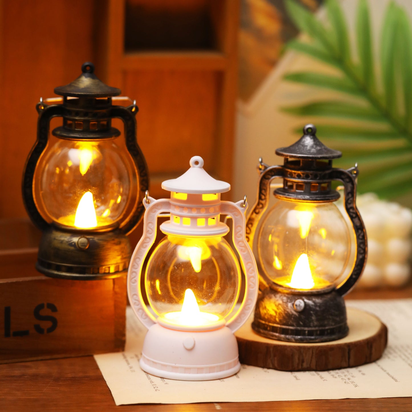 Mini LED lantern with battery included, ideal for decoration in bedroom, desk, wedding, party, or holidays. Made of plastic with faux candle light, non-rechargeable button battery included.