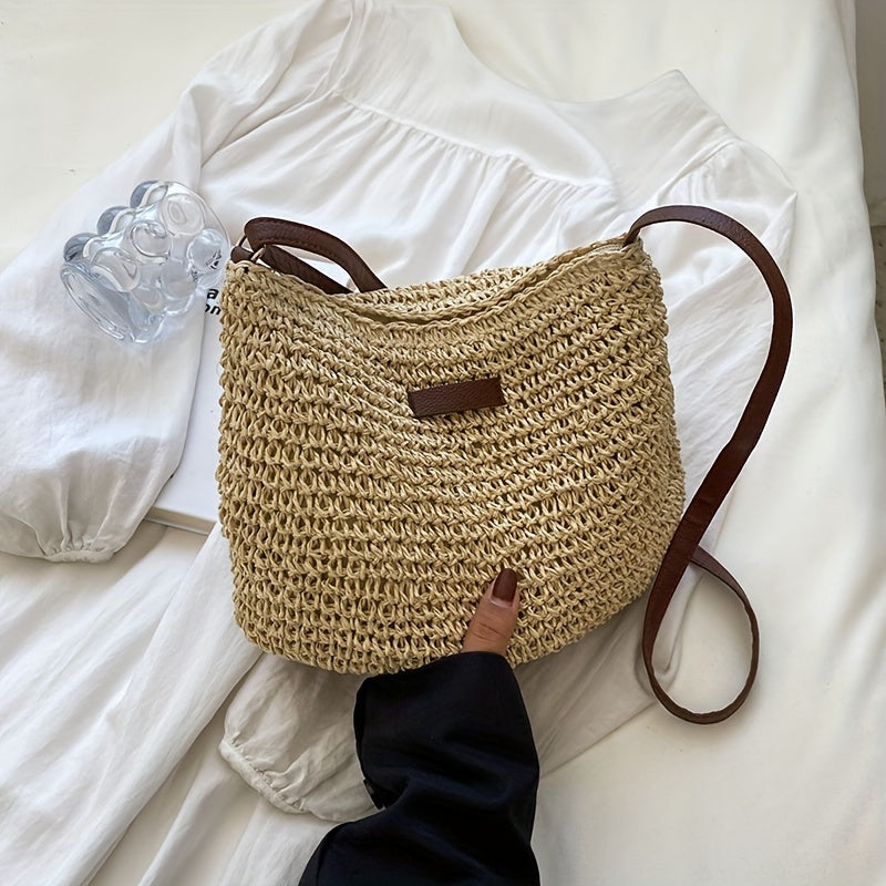 Handmade rattan crossbody bag for women, woven straw shoulder bag for summer.