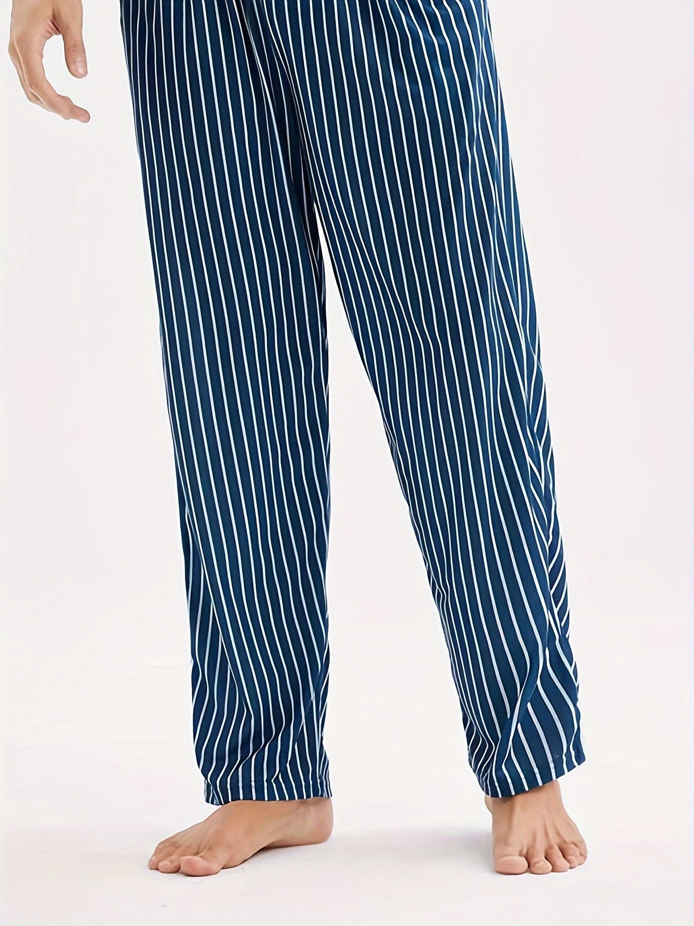 Men's Casual Crew Neck Short Sleeve Pajama Set with Striped Pants, made of 100% Polyester Knit Fabric, with Slight Stretch for All Season Comfort.