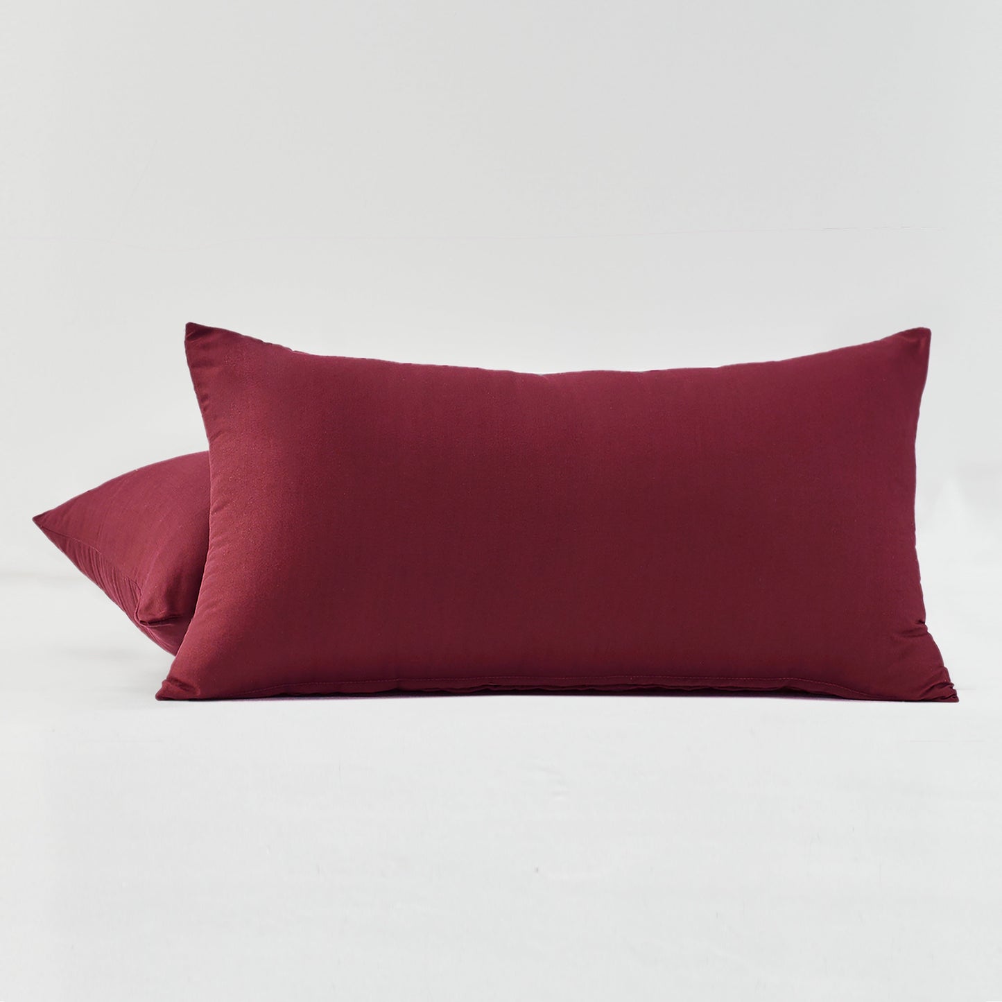 Two pillowcases made of ultra-fine microfiber solid color brushed fabric, fashioned from 100% polyester, perfect for the bedroom. Set includes 2 pillowcases.