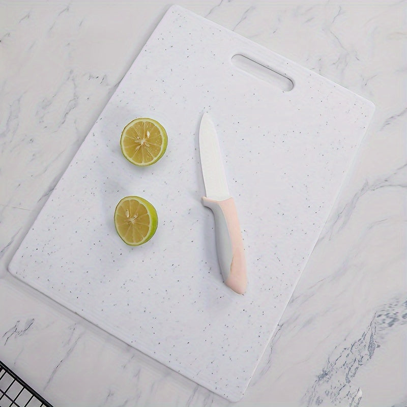 Set of three cutting boards with a marble pattern made of food-safe polystyrene. Suitable for chopping fruits and vegetables, these boards are durable, easy to clean, and feature a stylish black and white marble design.