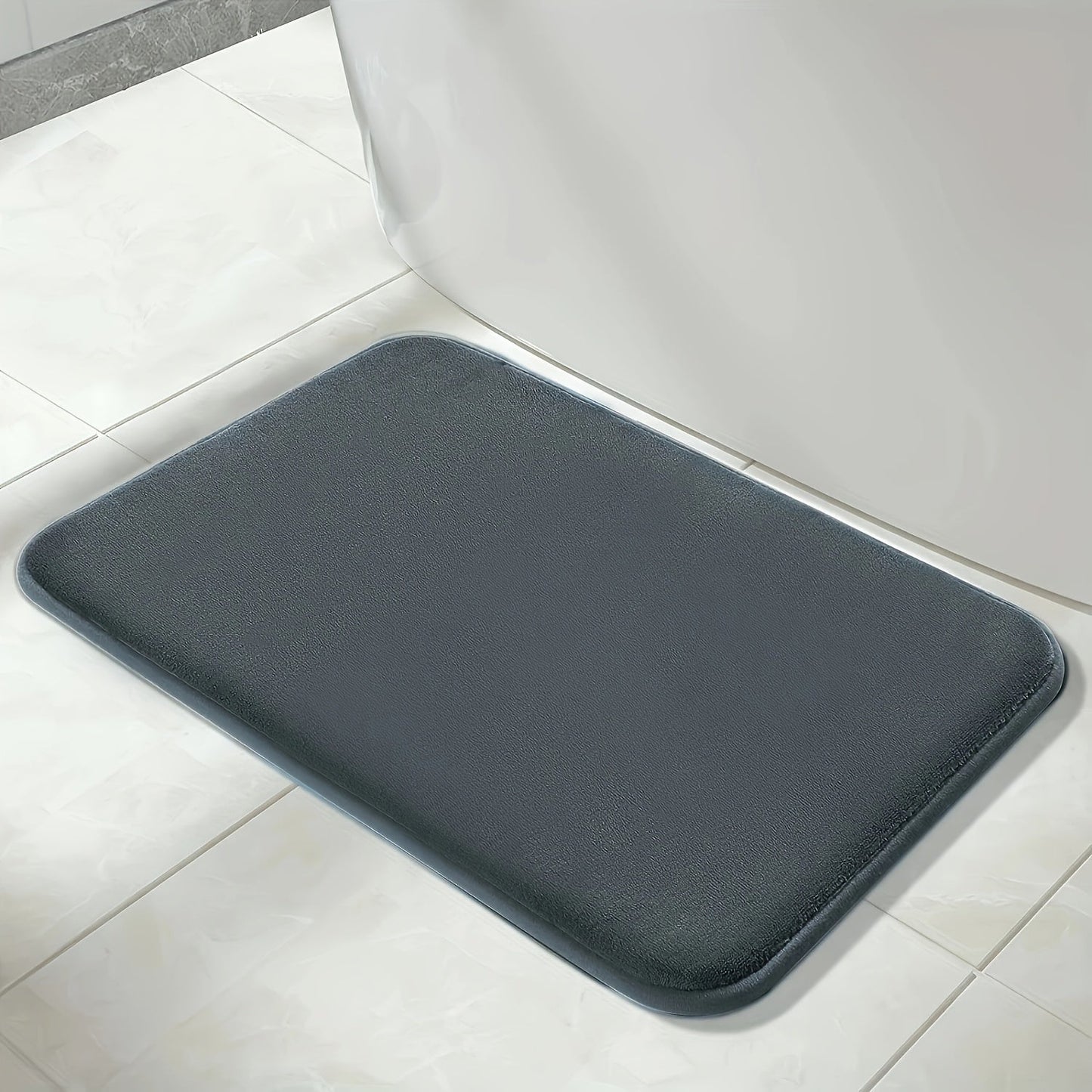 One set of three extended memory foam bath mats featuring a durable non-slip design. Set includes a U-shaped mat, toilet lid cover pad, and cozy bathroom decor for bedroom and living room. Suitable for use in spring, summer, autumn, and winter with a