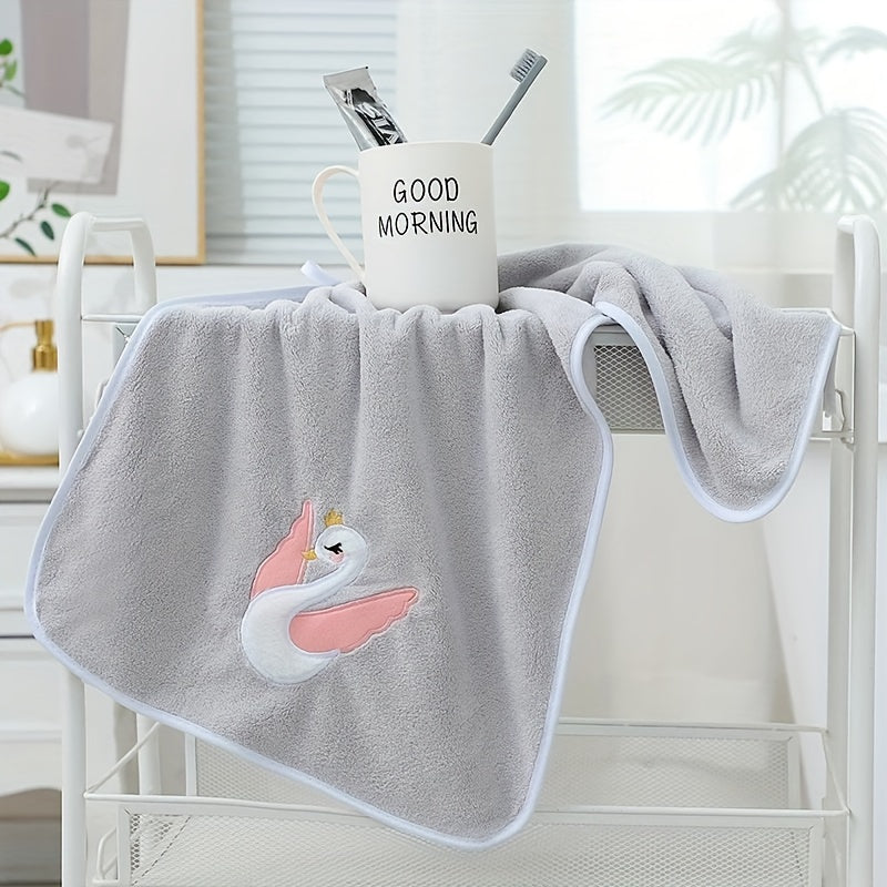 A 75*35cm Cartoon Swan Kid's Bath Towel with premium softness, absorbency, and quick-drying capability, ideal for use in the bathroom or at home.