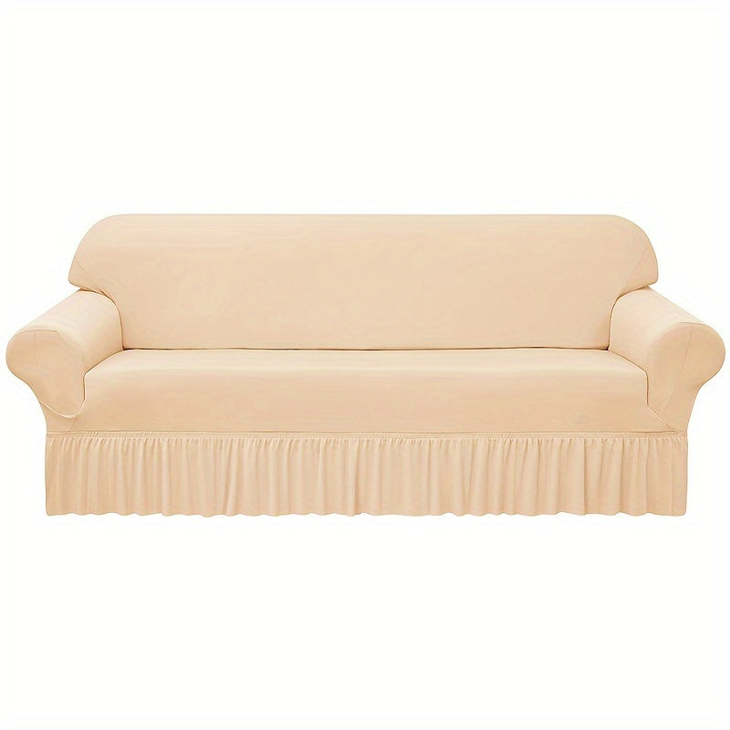 Elastic waterproof sofa slipcover with skirt for all seasons, ideal furniture protection for home and office.